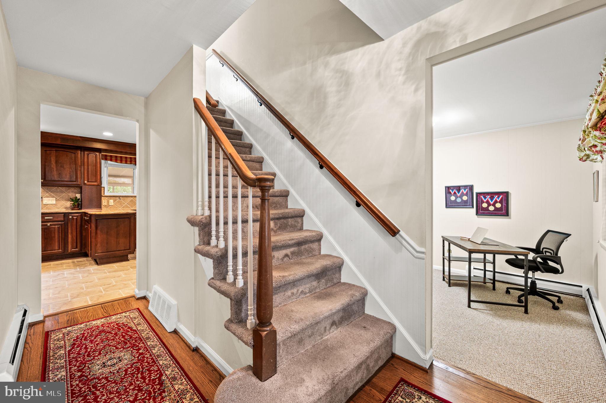 509 Lawrence Drive Springfield, PA 19064 - Photo 5 of 37 a view of entryway and hall with wooden floor