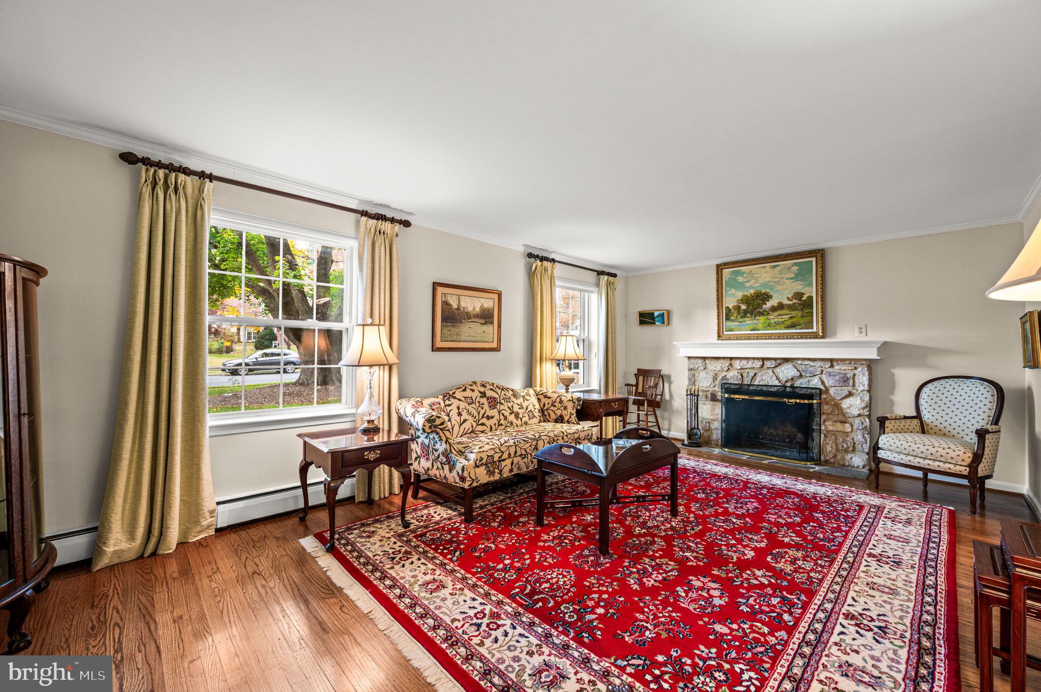 509 Lawrence Drive Springfield, PA 19064 - Photo 9 of 37 a living room with furniture rug and window