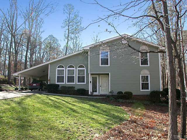 2717 Salisbury Raleigh, NC 27603 - Photo 2 of 12 a front view of house with yard and green space