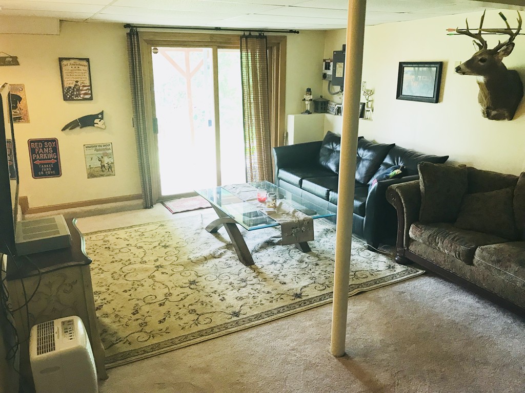 104 Fitzgerald Road Charlton, MA 01507 - Photo 10 of 14 a bedroom with a couch and a couch