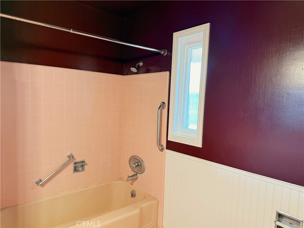 2030 East 3rd Street, Unit 5 Long Beach, CA 90814 - Photo 17 of 23 a bathroom with a bathtub and a shower