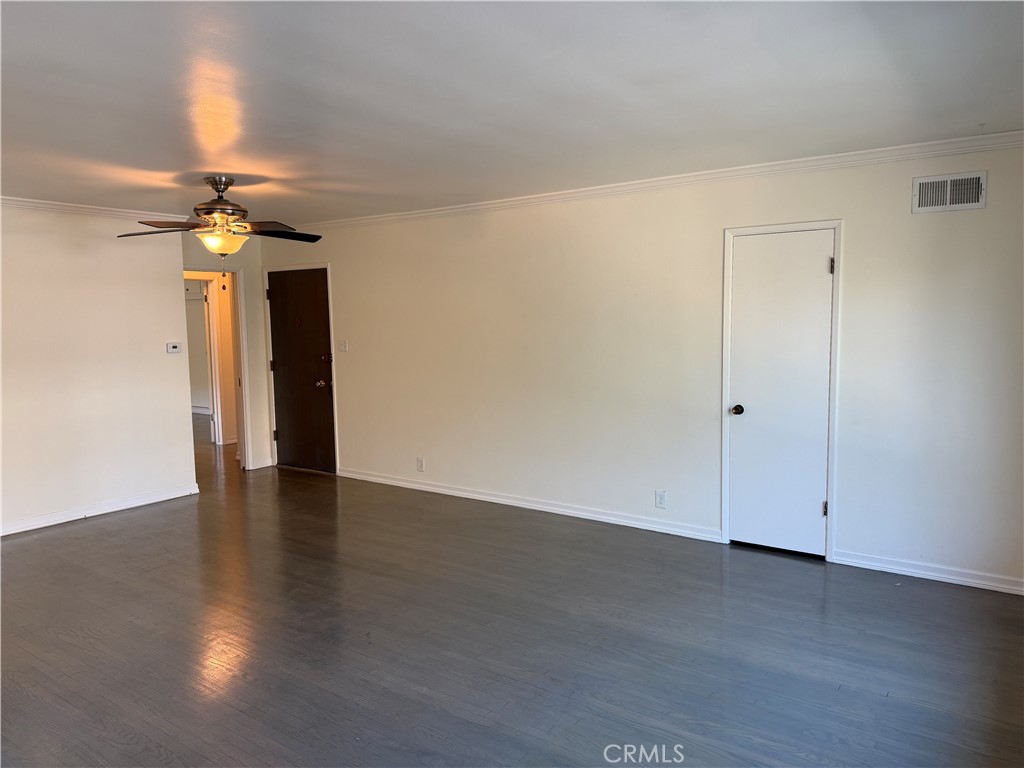 2030 East 3rd Street, Unit 5 Long Beach, CA 90814 - Photo 6 of 23 a view of an empty room with wooden floor