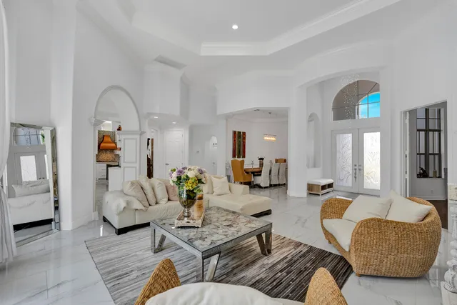 a living room with furniture fireplace and a fireplace