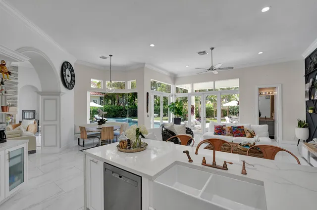 a spacious bathroom with a double vanity sink and a bathtub