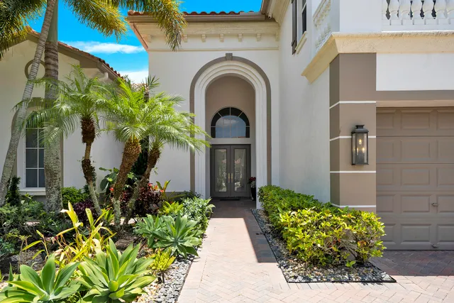 a view of a entryway with flower pots