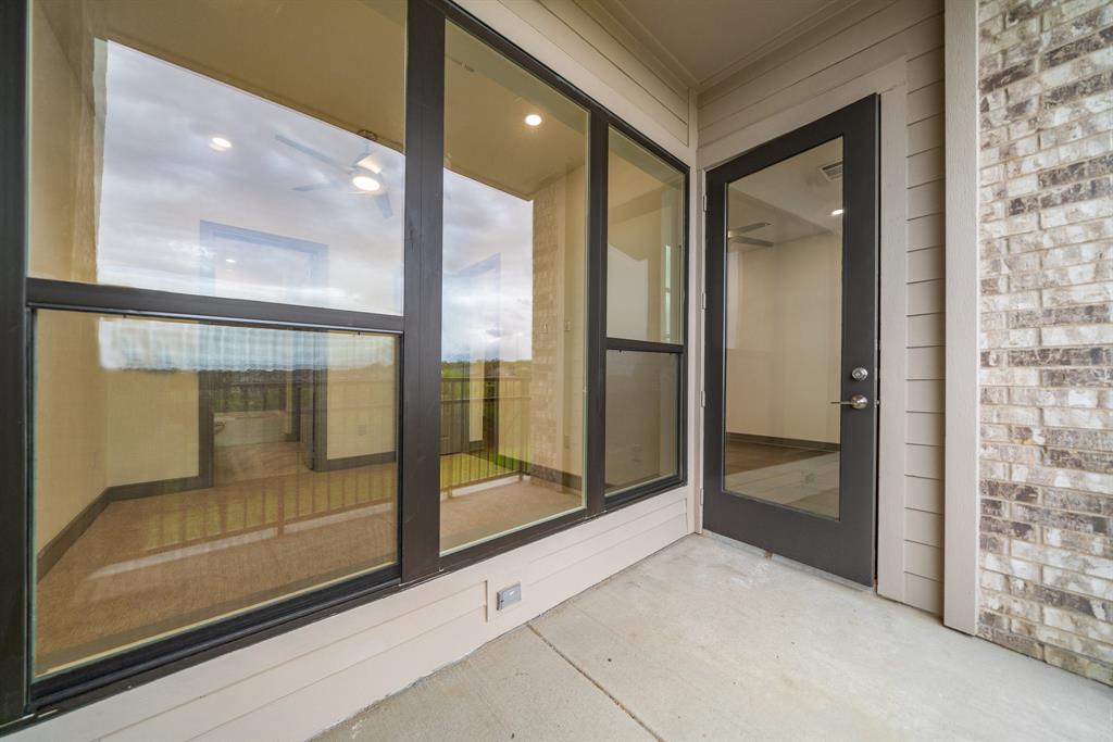 2700 Old Denton Road, Unit 3336 Carrollton, TX 75007 - Photo 22 of 29 a bathroom with a glass shower door and a mirror