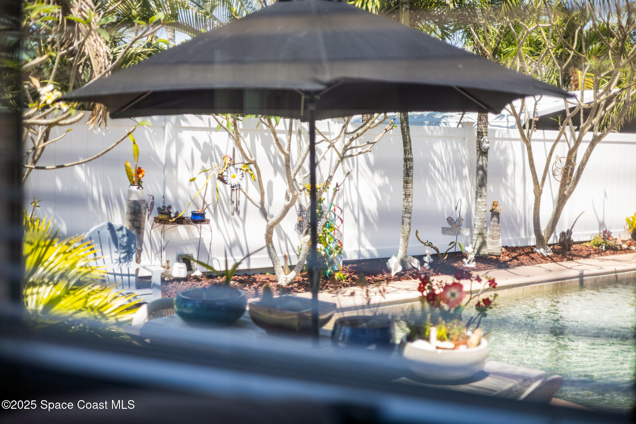 2571 Carmel Road Indialantic, FL 32903 - Photo 37 of 68 View of Your Pool from Inside
