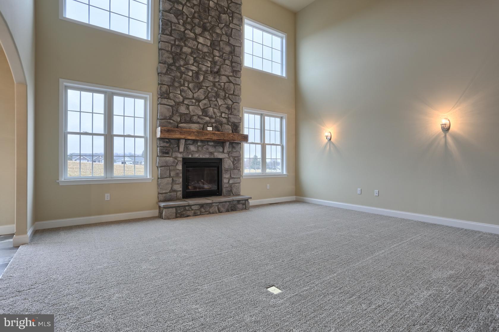 23 Rolling Meadow Road Lebanon, PA 17046 - Photo 11 of 44 an empty room with windows and fireplace