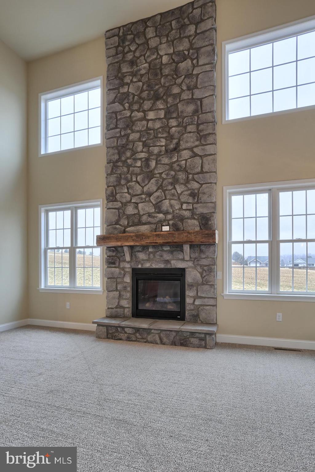 23 Rolling Meadow Road Lebanon, PA 17046 - Photo 14 of 44 an empty room with windows and fireplace