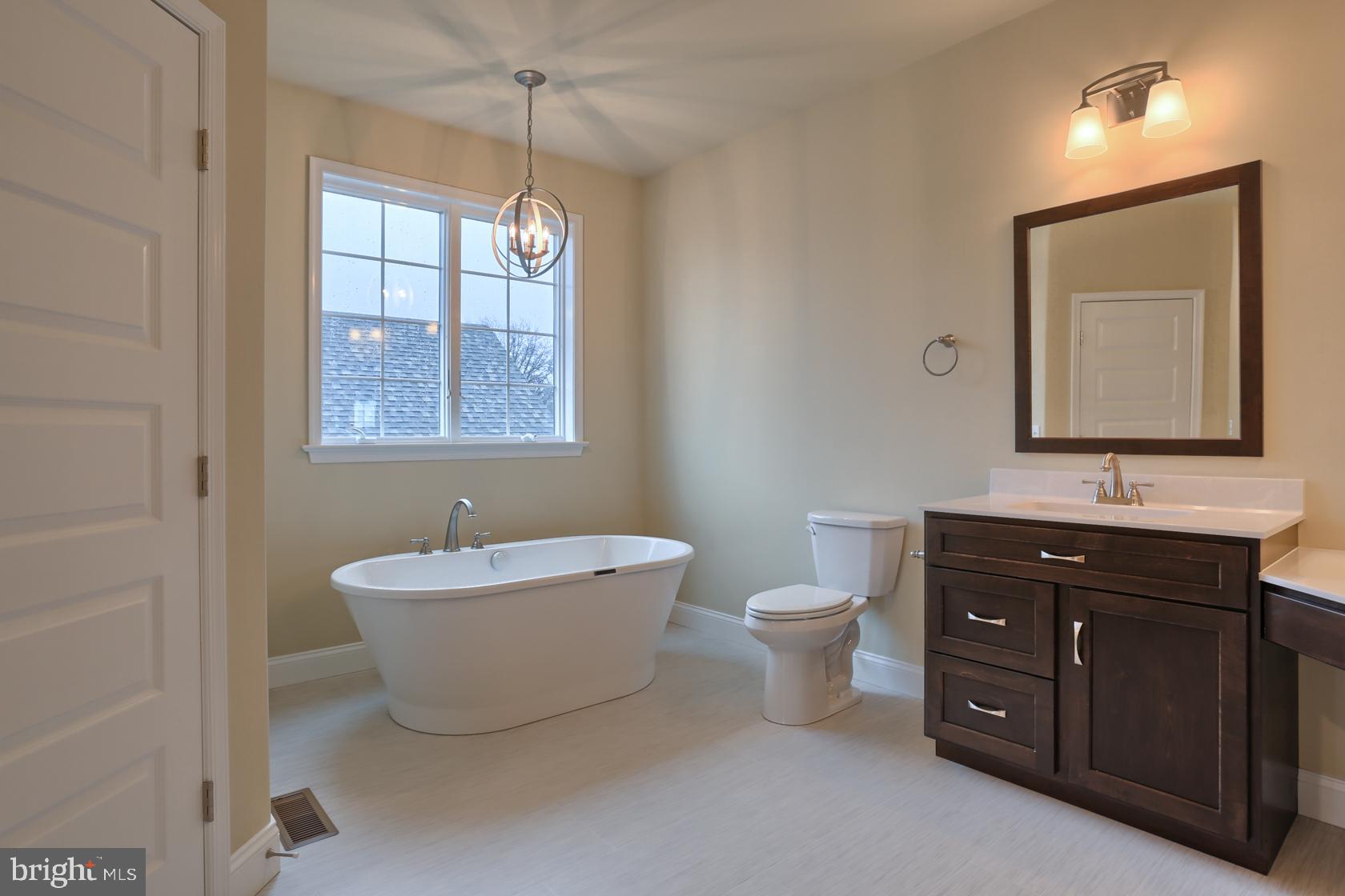 23 Rolling Meadow Road Lebanon, PA 17046 - Photo 31 of 44 a bath room with a toilet a sink and a mirror