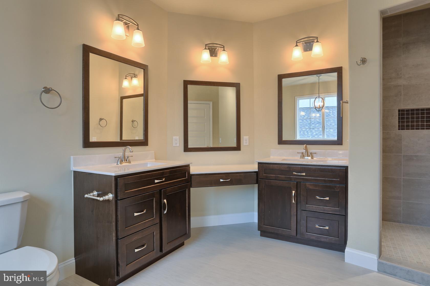 23 Rolling Meadow Road Lebanon, PA 17046 - Photo 32 of 44 a spacious bathroom with a double vanity sink and a mirror