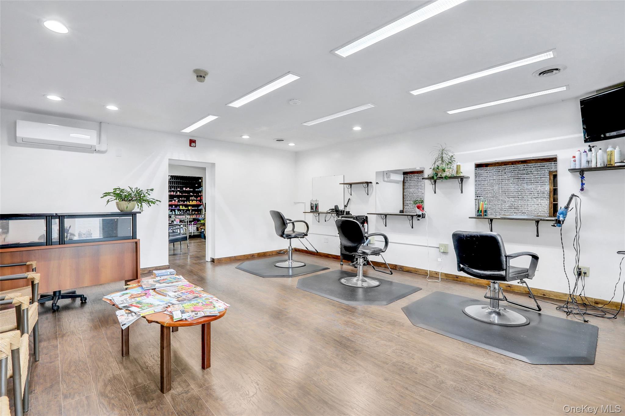 199 Highway 299, Unit 103 Highland, NY 12528 - Photo 3 of 9 a living room with furniture and a table