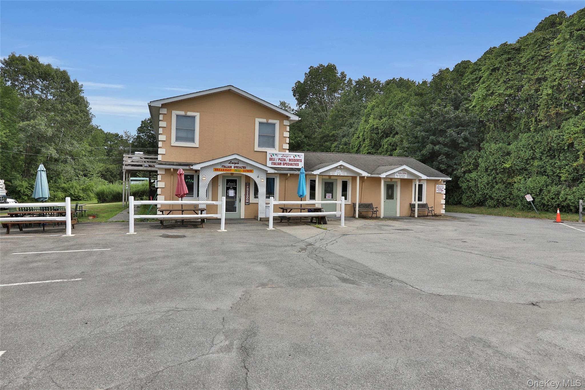 199 Highway 299, Unit 103 Highland, NY 12528 - Photo 8 of 9 a view of house with outdoor space and sitting area