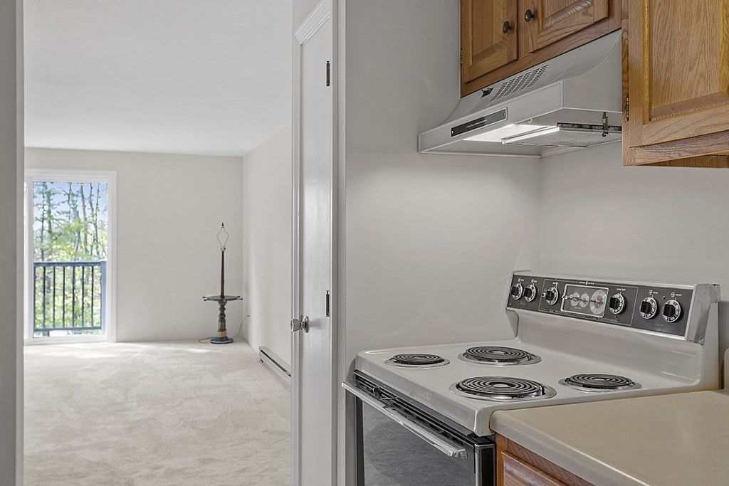 27 Ernest Avenue, Unit 24 Exeter, NH 03833 - Photo 11 of 38 a view of kitchen with washer and dryer