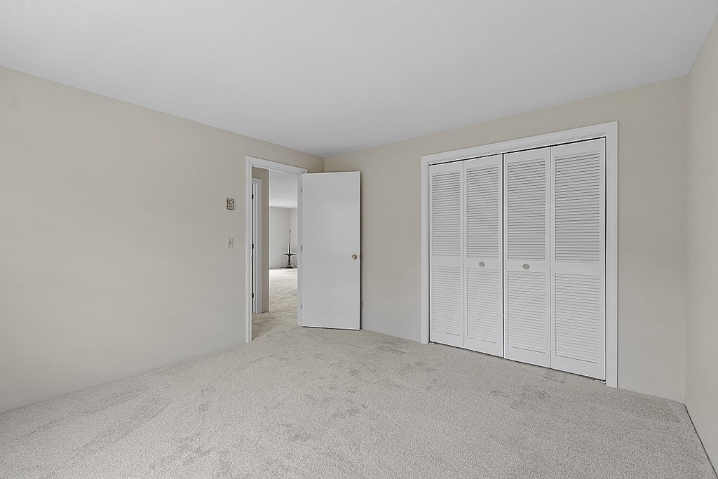 27 Ernest Avenue, Unit 24 Exeter, NH 03833 - Photo 23 of 38 a view of an empty room