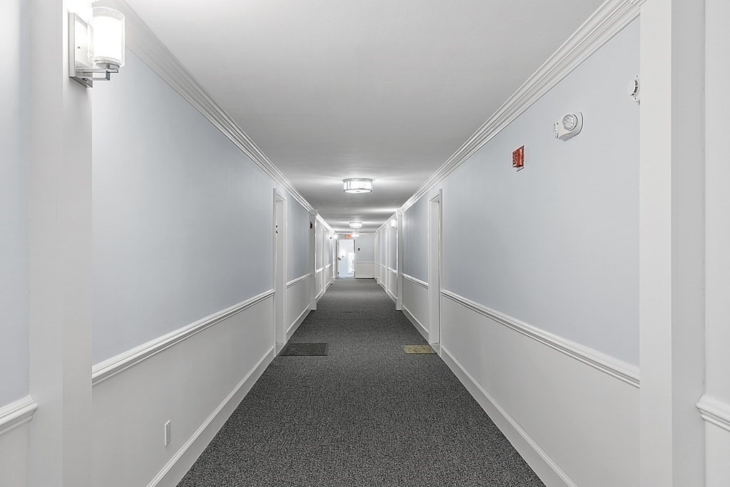 27 Ernest Avenue, Unit 24 Exeter, NH 03833 - Photo 24 of 38 a view of a hallway