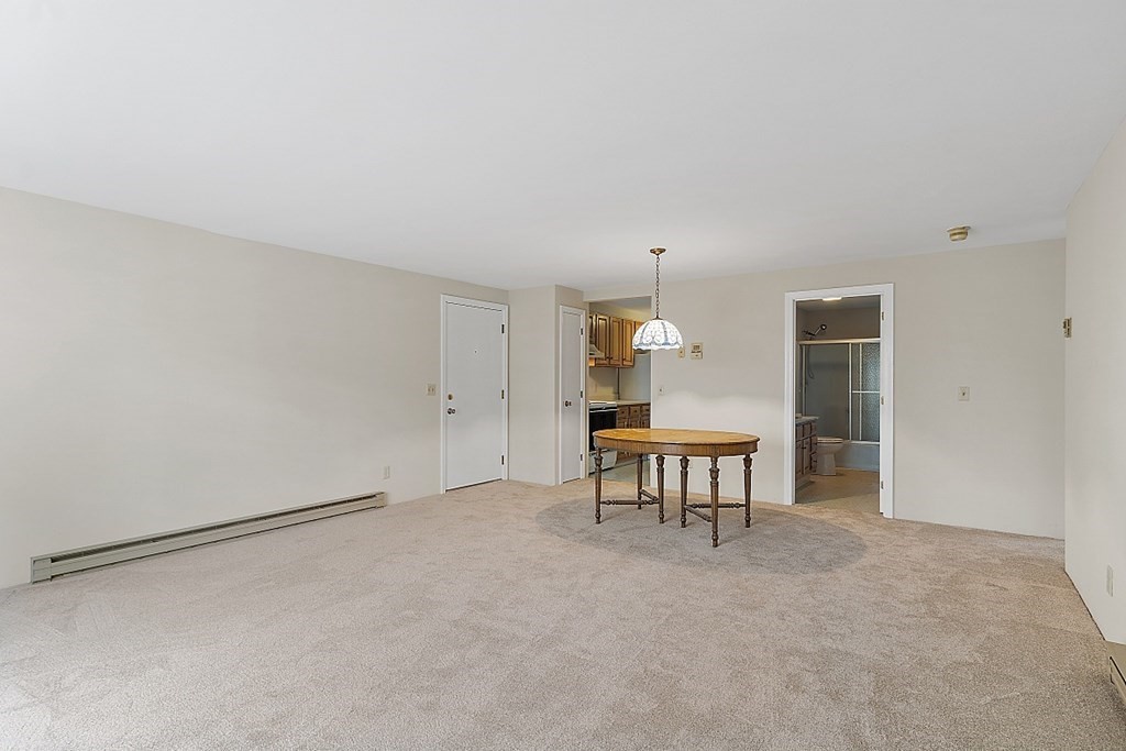 27 Ernest Avenue, Unit 24 Exeter, NH 03833 - Photo 4 of 38 a view of a livingroom with furniture
