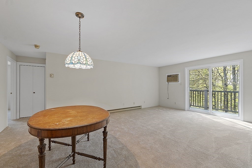 27 Ernest Avenue, Unit 24 Exeter, NH 03833 - Photo 6 of 38 a view of a bedroom with a window