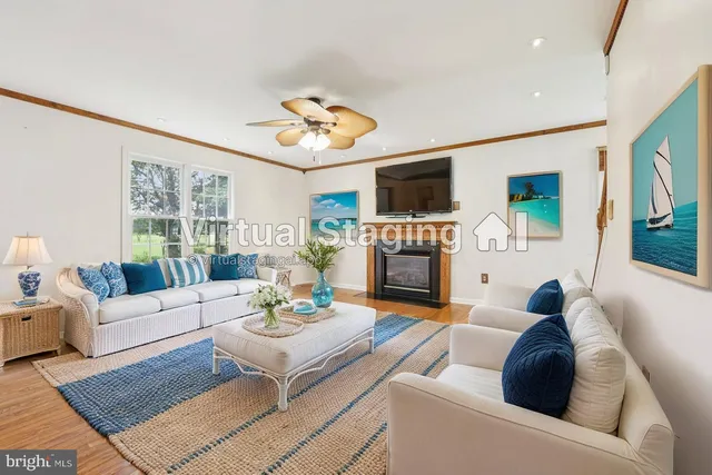 a view of a livingroom with wooden floor