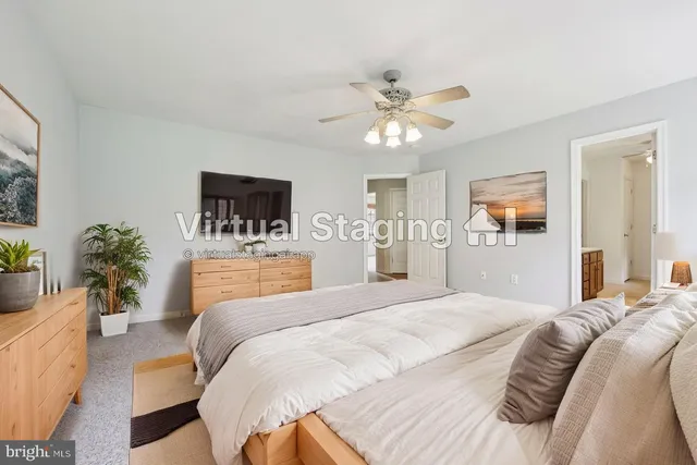 a bathroom with a shower and a glass door
