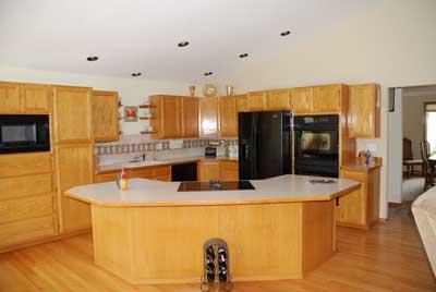 528 South Hennessy Road Yakima, WA 98908 - Photo 11 of 26 a kitchen with stainless steel appliances granite countertop a sink a stove and a refrigerator