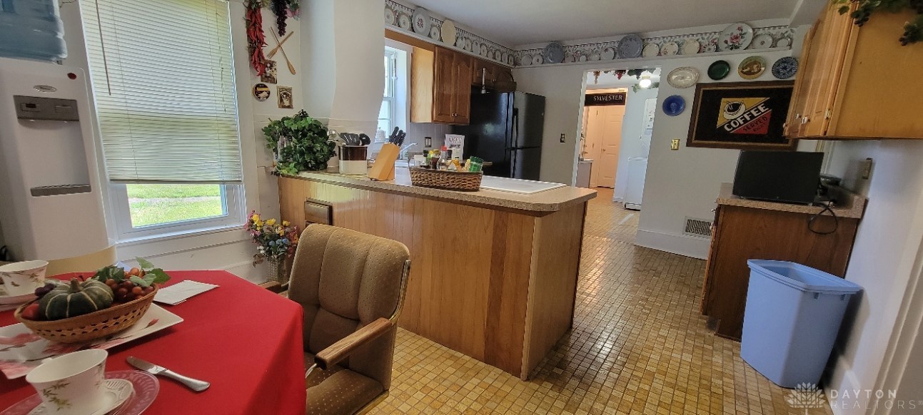 9814 Castine-Gordon Road Laura, OH 45337 - Photo 12 of 23 Breakfast area with kitchen