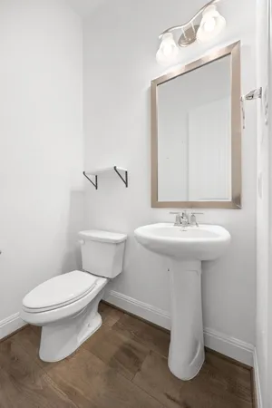 a view of a room with a ceiling fan