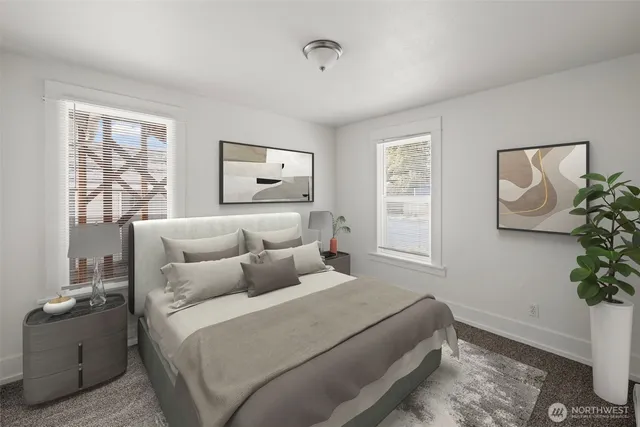 a bedroom with bed and a window