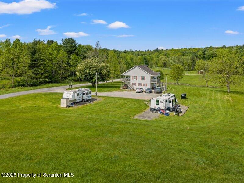 9-17 Vago Road Tunkhannock, PA 18657 - Photo 41 of 57 a view of a house with a yard