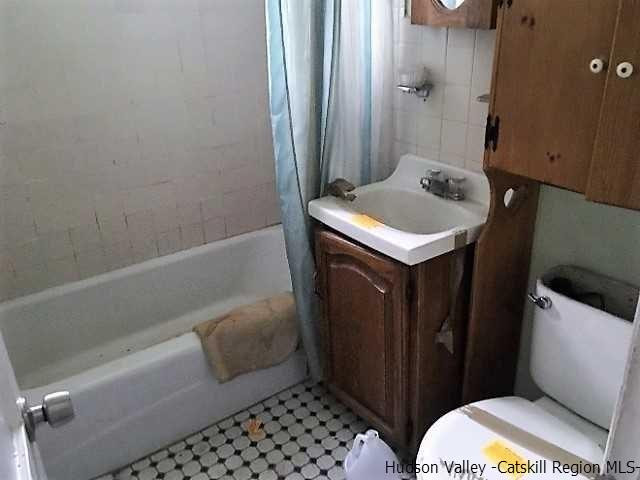 12 Clove Road Fishkill, NY 12524 - Photo 11 of 11 a bathroom with a sink toilet and shower