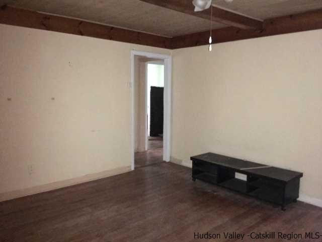 12 Clove Road Fishkill, NY 12524 - Photo 5 of 11 a room with wooden floor and natural light