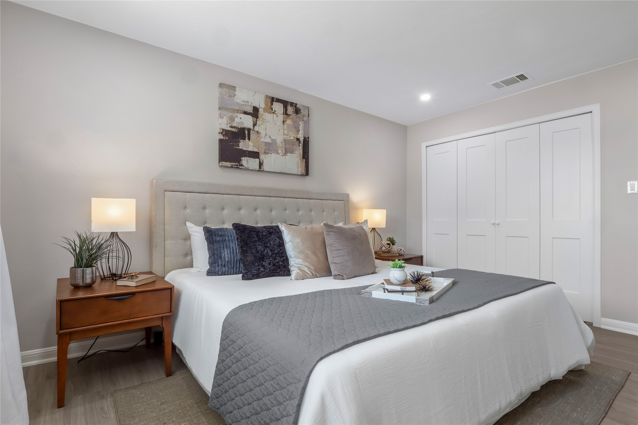 8007 Colony Loop Drive Austin, TX 78724 - Photo 14 of 40 Spacious primary suite with neutral finishes, recessed lighting, and a large double-door closet.