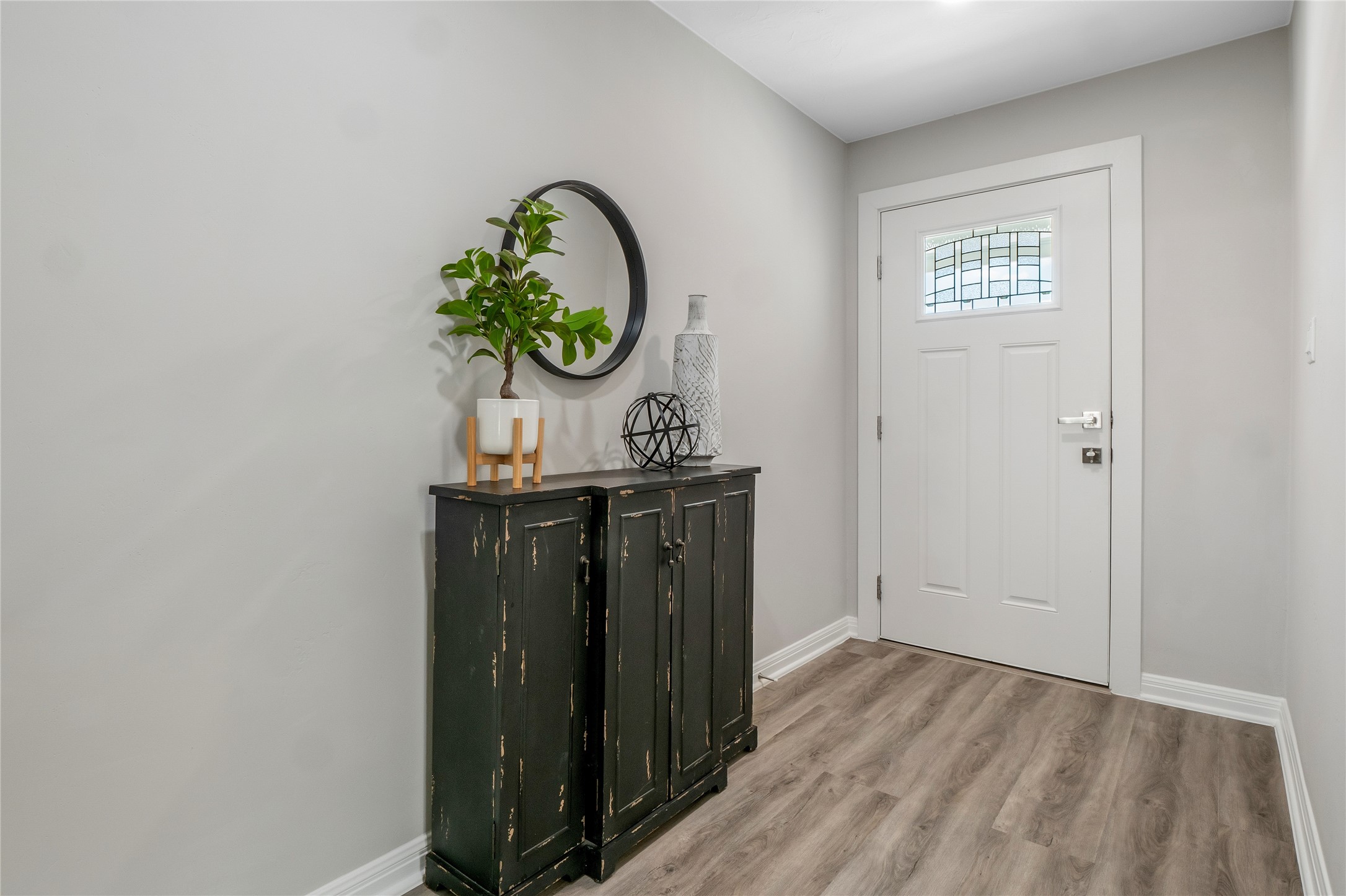 8007 Colony Loop Drive Austin, TX 78724 - Photo 23 of 40 Welcoming entry with modern lighting and fresh finishes that set the tone for the home.