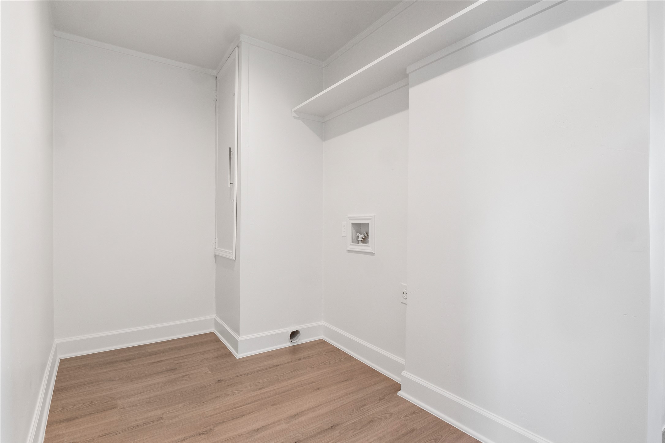 8007 Colony Loop Drive Austin, TX 78724 - Photo 26 of 40 Dedicated laundry room with upper storage shelf and functional layout.