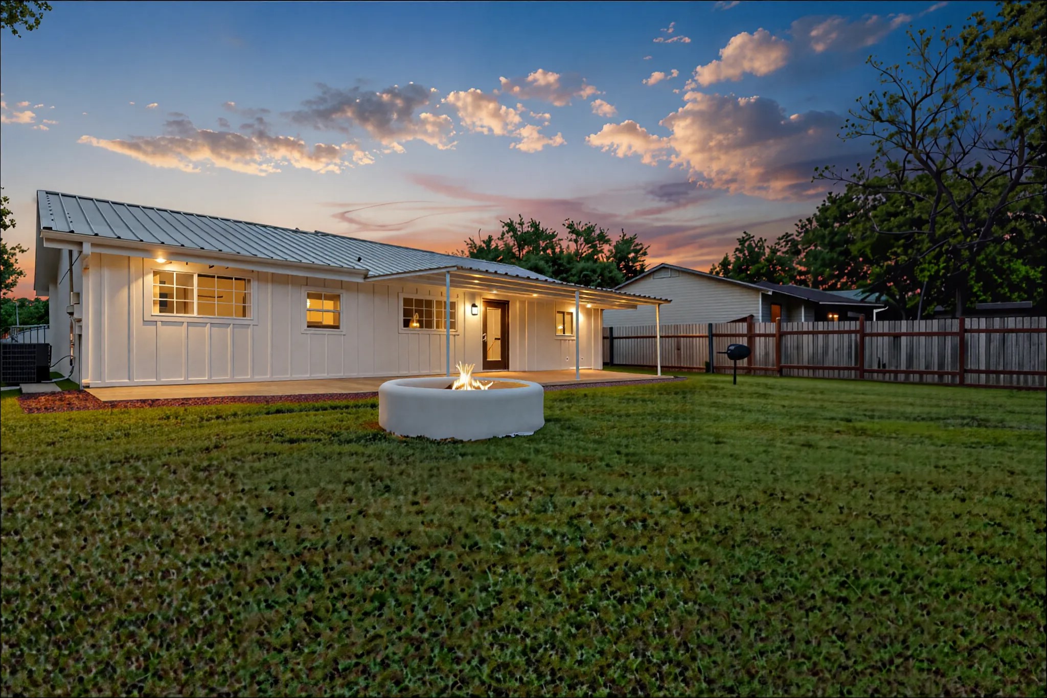 8007 Colony Loop Drive Austin, TX 78724 - Photo 33 of 40 Backyard fire pit creates the perfect setting for cozy nights, outdoor gatherings, and relaxed Texas evenings.