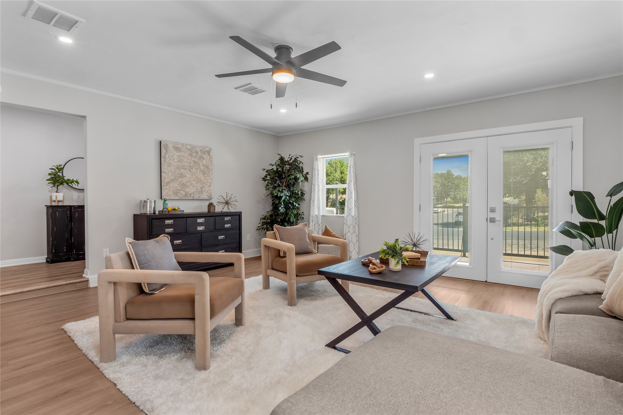 8007 Colony Loop Drive Austin, TX 78724 - Photo 34 of 40 Bright, inviting living room filled with natural light and an easy flow into adjoining living spaces.