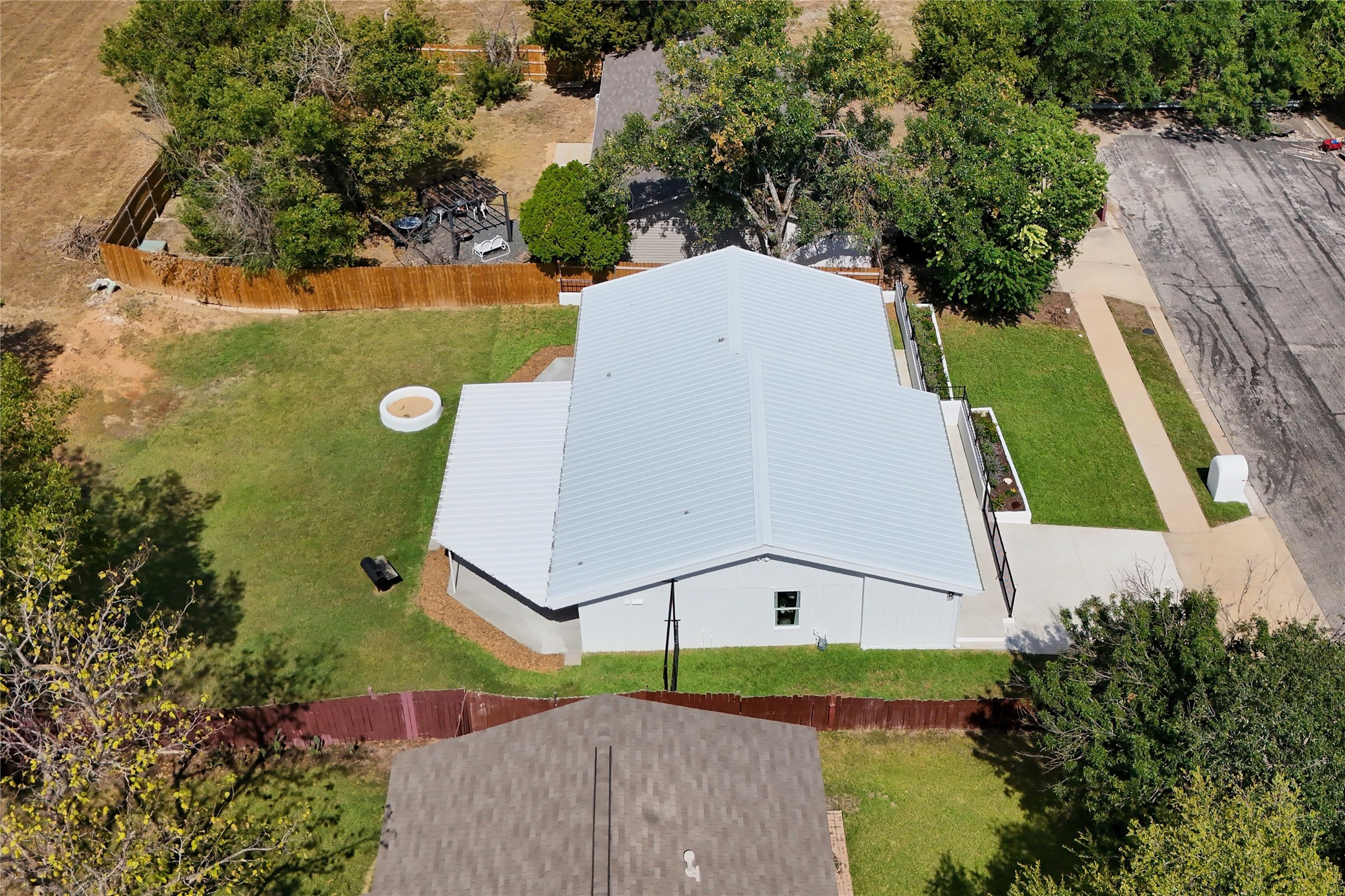 8007 Colony Loop Drive Austin, TX 78724 - Photo 37 of 40 Aerial perspective highlighting lot size, driveway space, and single-story layout with no HOA and room to spread out.