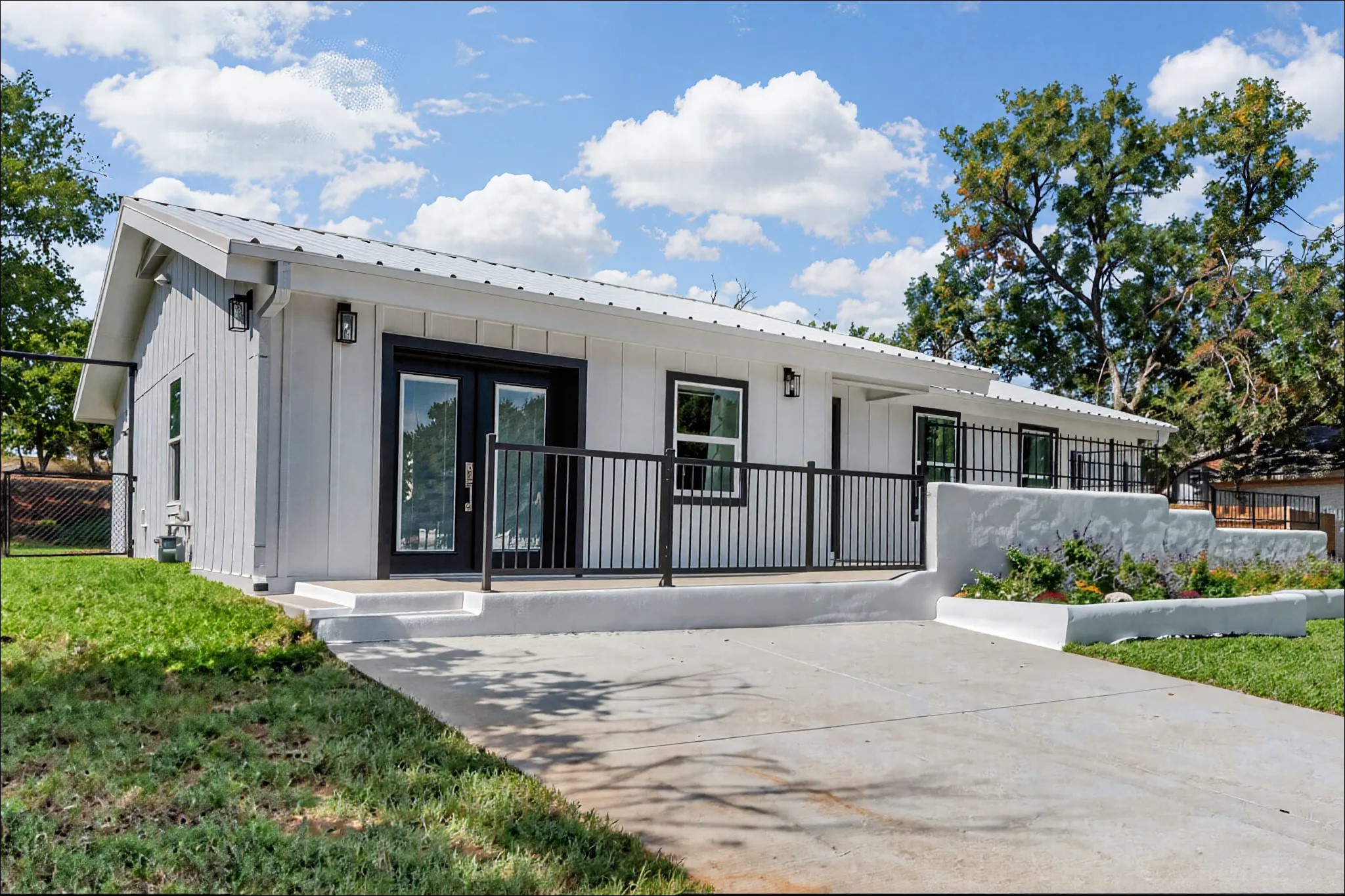 8007 Colony Loop Drive Austin, TX 78724 - Photo 4 of 40 Modern single-story with refreshed curb appeal, clean lines, and inviting outdoor space.