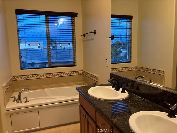 a bathroom with a sink and a bathtub