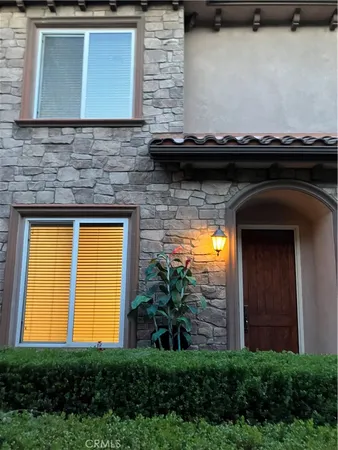 a view of house with yard