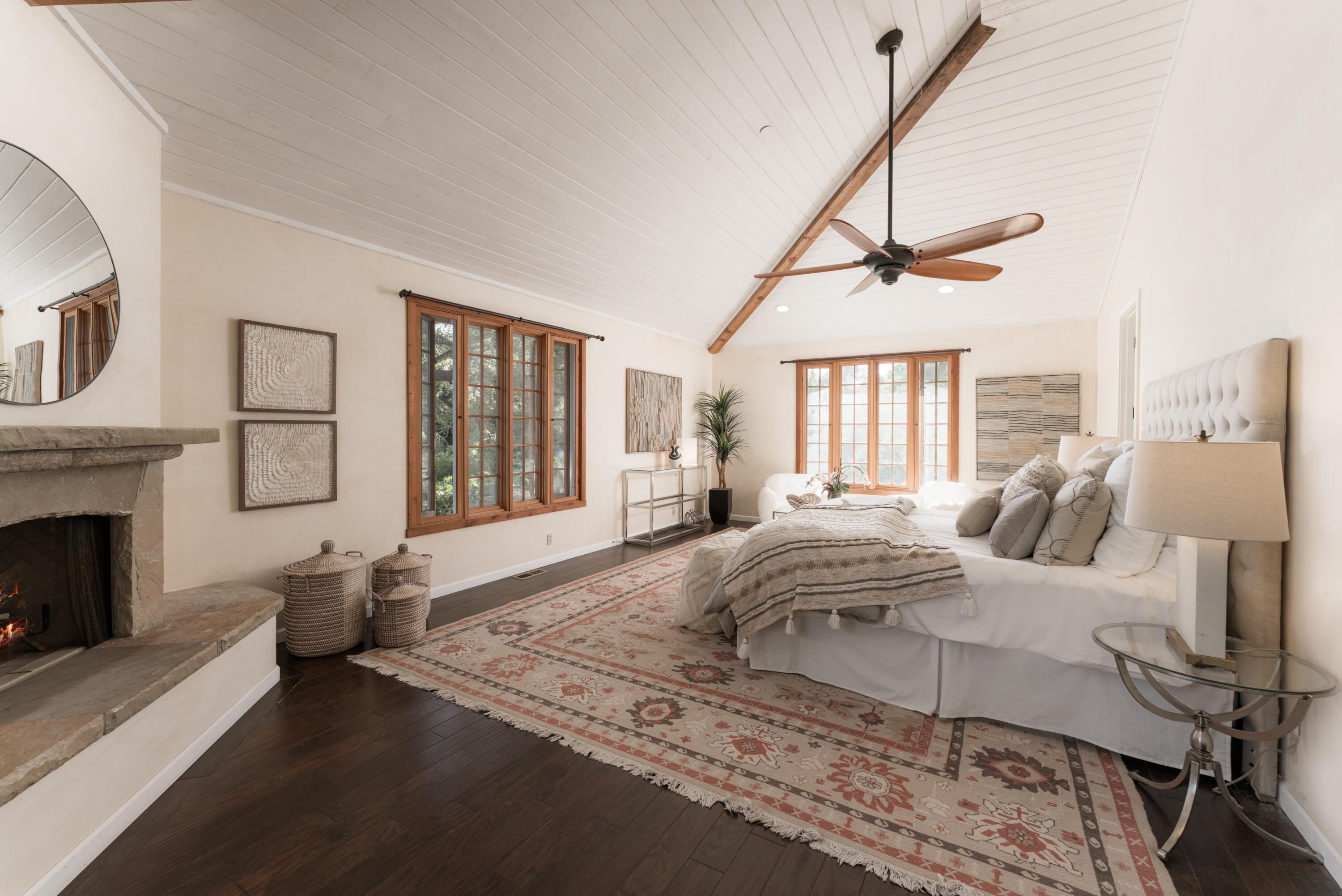 690 San Ysidro Road Montecito, CA 93108 - Photo 12 of 34 a bedroom with a bed and wooden floor