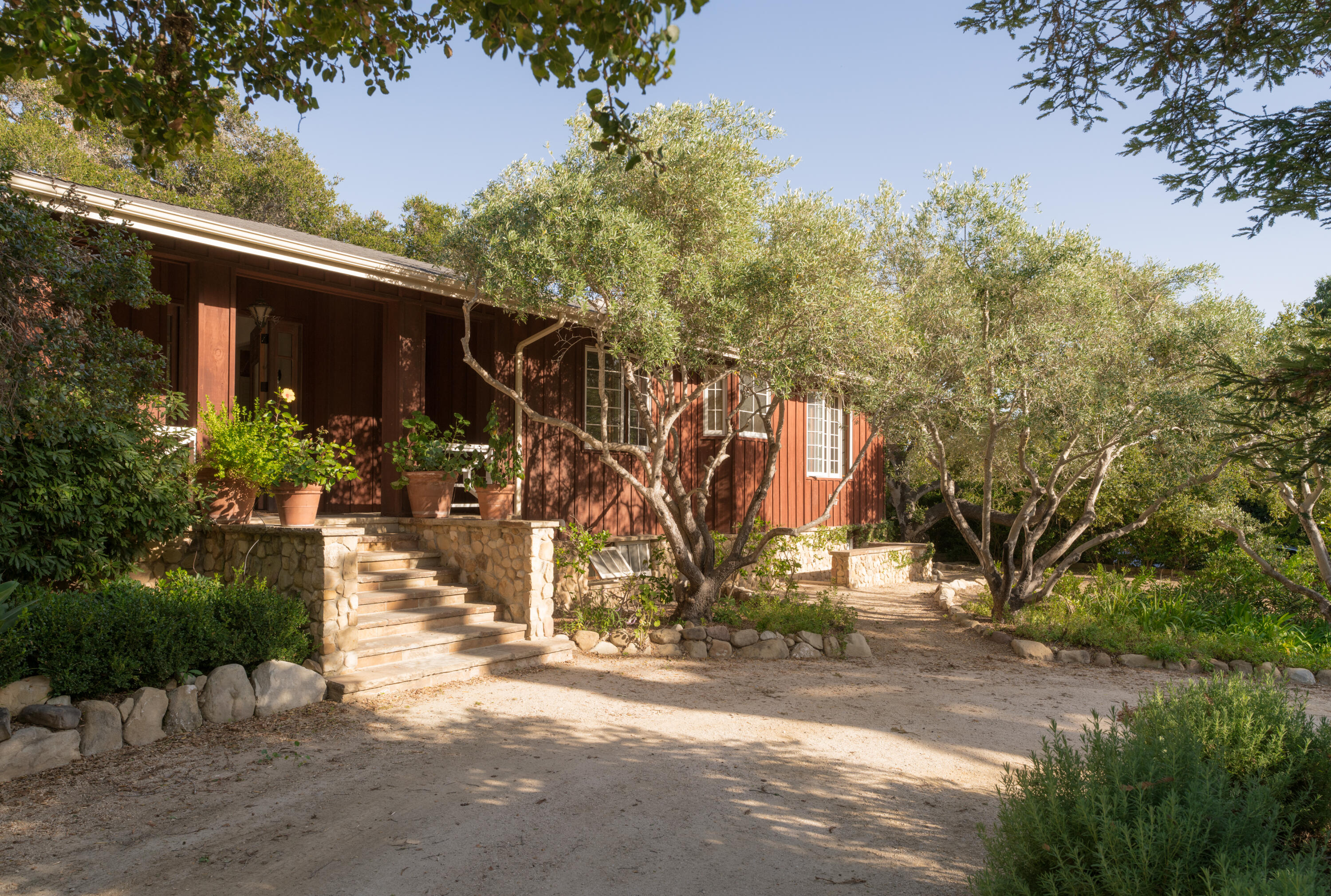 690 San Ysidro Road Montecito, CA 93108 - Photo 25 of 34 a view of a wooden door and a yard