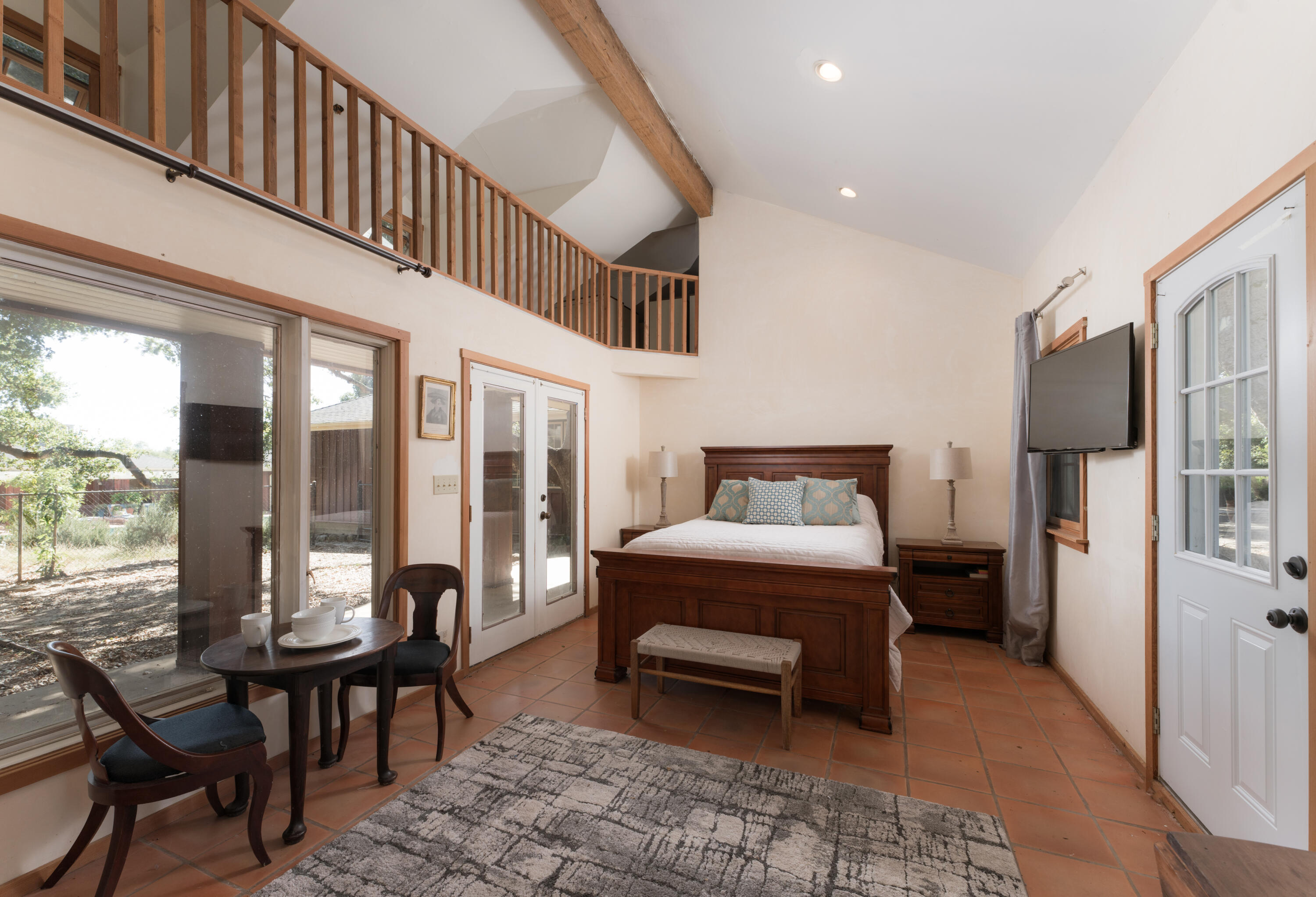 690 San Ysidro Road Montecito, CA 93108 - Photo 27 of 34 a bedroom with furniture and a window