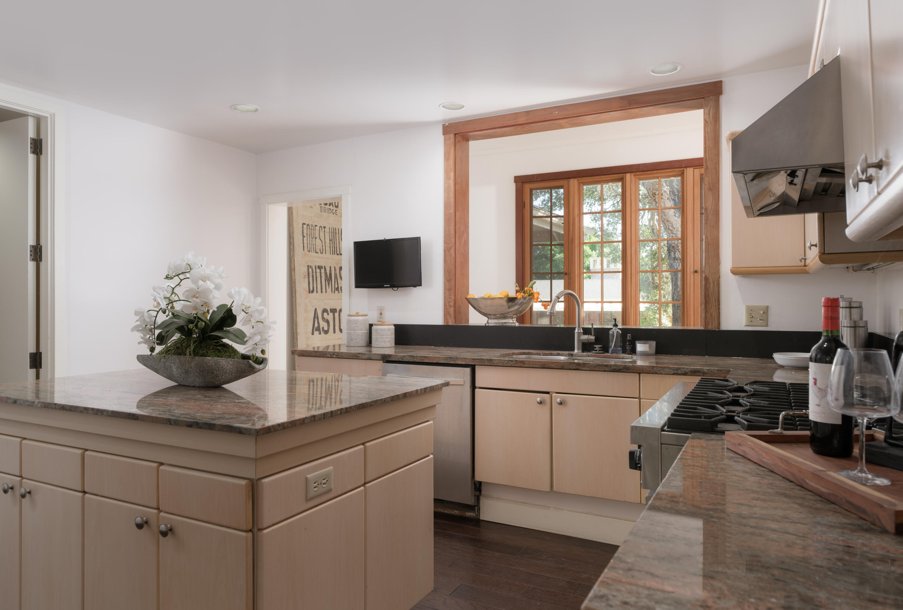 690 San Ysidro Road Montecito, CA 93108 - Photo 9 of 34 a kitchen with stainless steel appliances granite countertop a sink and a stove