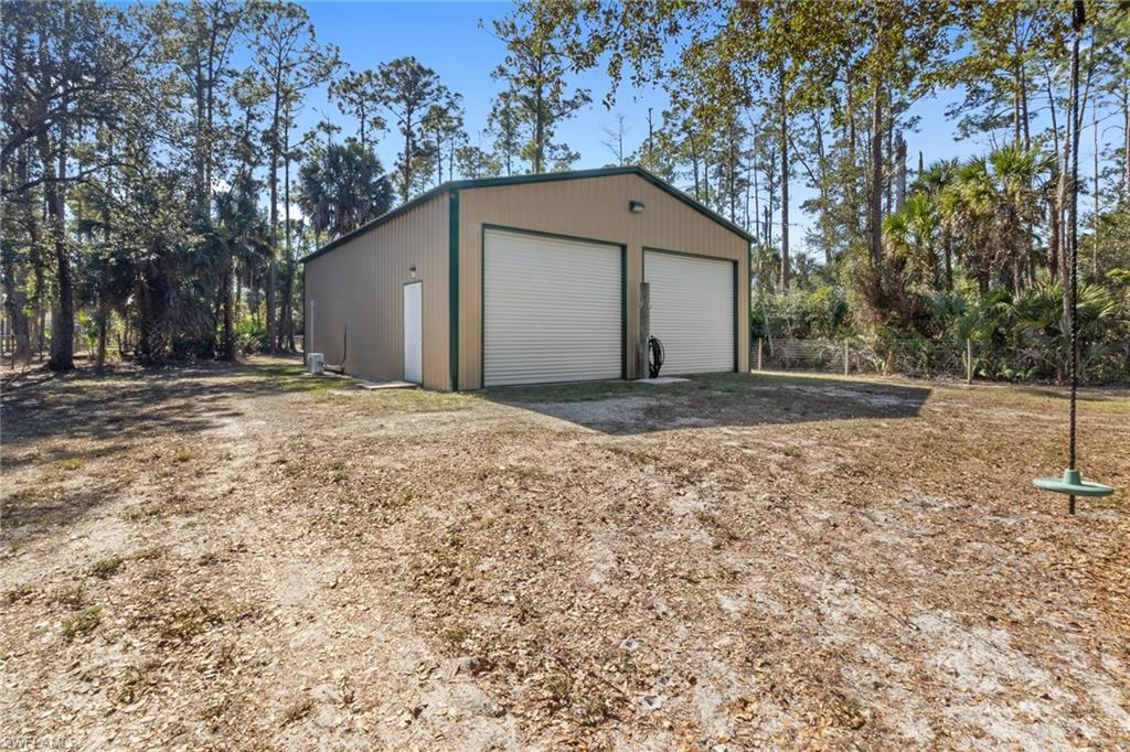 a house with trees in the background