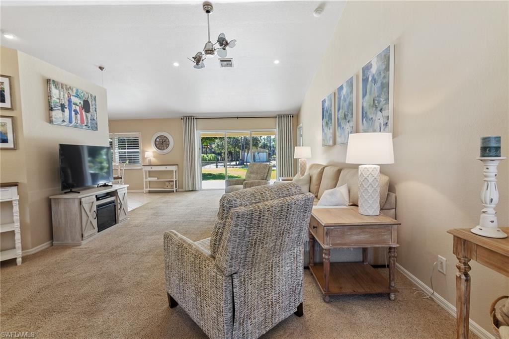 220 18th Avenue Northwest Naples, FL 34120 - Photo 6 of 18 a living room with furniture and a flat screen tv