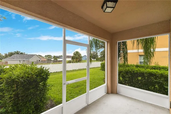 a view of a balcony with an outdoor space