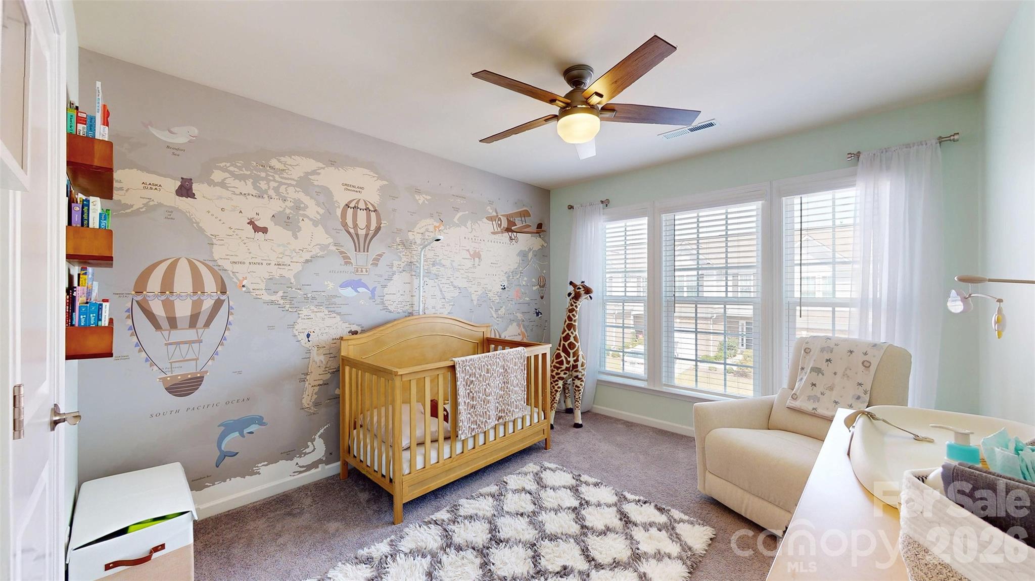 827 Canoe Song Road Fort Mill, SC 29708 - Photo 18 of 33 a living room with a baby crib furniture and a window