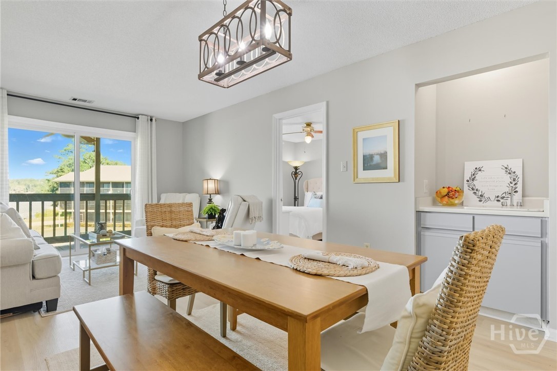 207 Azalea Road, Unit 21 Midway, GA 31320 - Photo 15 of 46 Stylish box chandelier lighting.