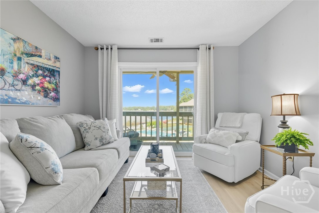 207 Azalea Road, Unit 21 Midway, GA 31320 - Photo 17 of 46 Light and bright living area.